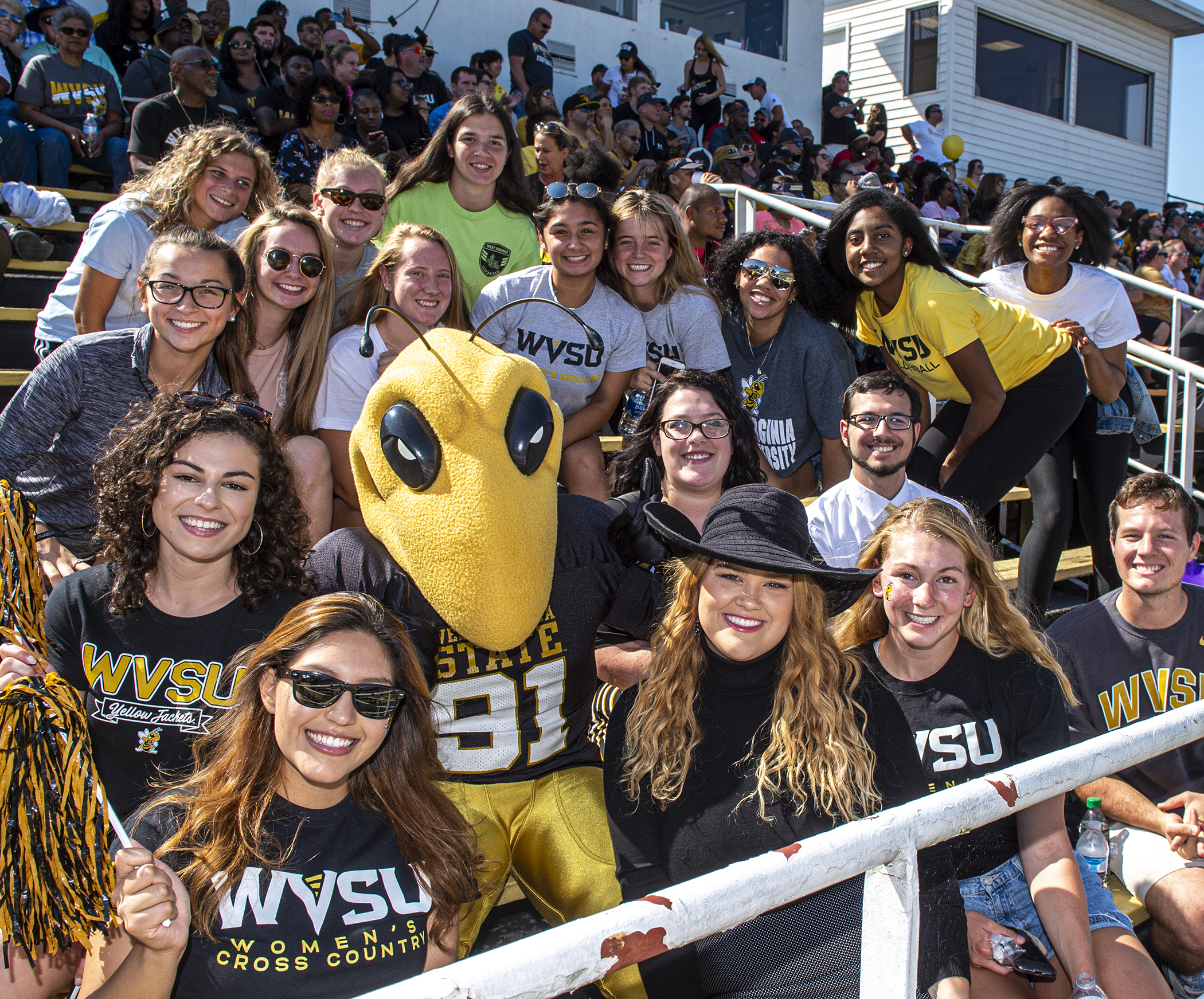 Students pose with the WVSU mascot